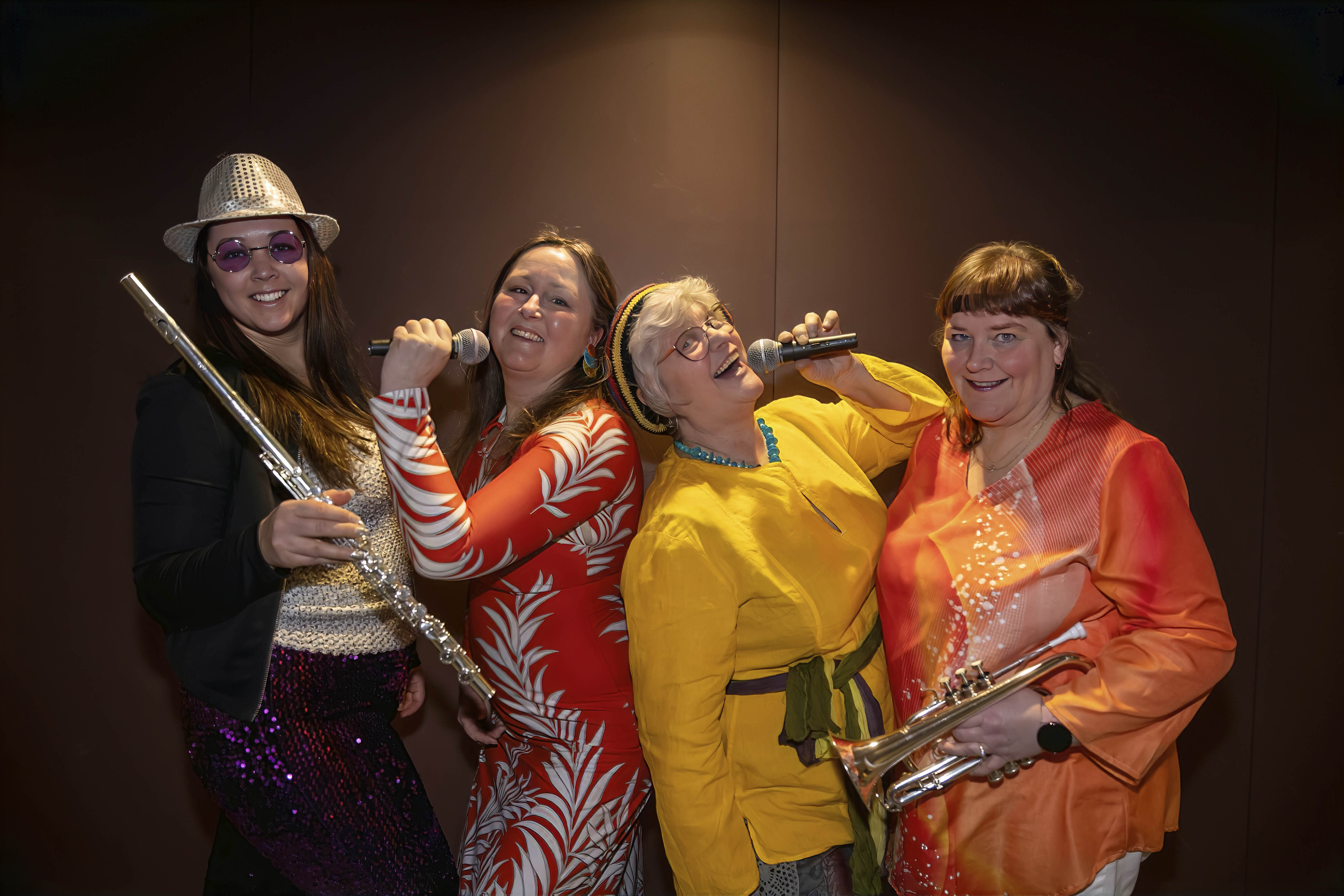 Fra venstre: Caroline Nordgård (Hurdal Flis & Messingblås), Mona Fossum, Bjørg Skogholt og Anita Lien Jensen (Eidsvold Værk Musikkorps)